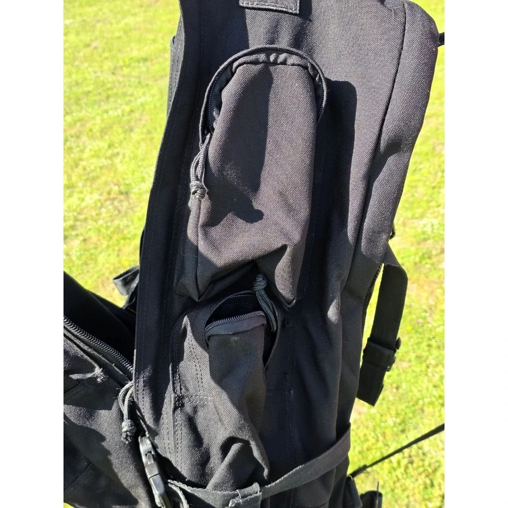 black tactical backpack is a Sandpiper of California Bugout Bag **see Pics**
